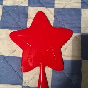 Red Jeffree Star handheld mirror